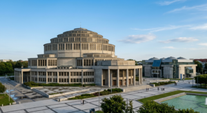 A high-quality architectural photograph of iconic Wroclaw modernist buildings, showcasing clean geom